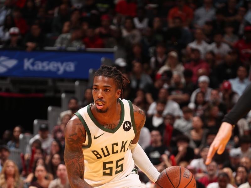 MIAMI, FL - NOVEMBER 26: Delon Wright #55 of the Milwaukee Bucks handles the ball during the game against the Miami Heat during the Emirates NBA Cup game on November 26, 2024 at Kaseya Center in Miami, Florida. NOTE TO USER: User expressly acknowledges and agrees that, by downloading and or using this Photograph, user is consenting to the terms and conditions of the Getty Images License Agreement. Mandatory Copyright Notice: Copyright 2024 NBAE (Photo by Issac Baldizon/NBAE via Getty Images)