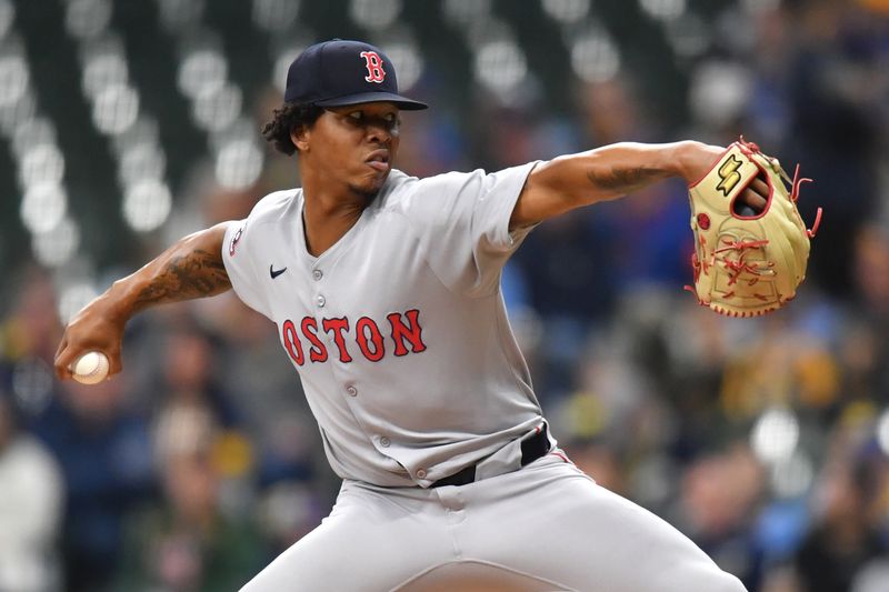 May 28, 2025; Milwaukee, Wisconsin, USA; Boston Red Sox starting pitcher Brayan Bello (66) pitches during the first inning against the Milwaukee Brewers at American Family Field. Mandatory Credit: Patrick Gorski-Imagn Images