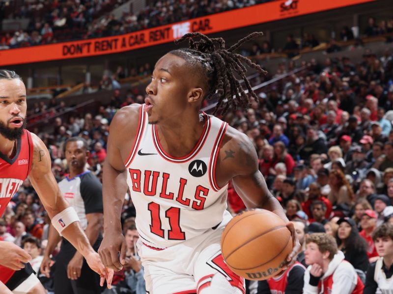 CHICAGO, IL - NOVEMBER 17: Ayo Dosunmu #11 of the Chicago Bulls dribbles the ball during the game against the Houston Rockets during a regular season game on November 17, 2024 at United Center in Chicago, Illinois. NOTE TO USER: User expressly acknowledges and agrees that, by downloading and or using this photograph, User is consenting to the terms and conditions of the Getty Images License Agreement. Mandatory Copyright Notice: Copyright 2024 NBAE (Photo by Jeff Haynes/NBAE via Getty Images)