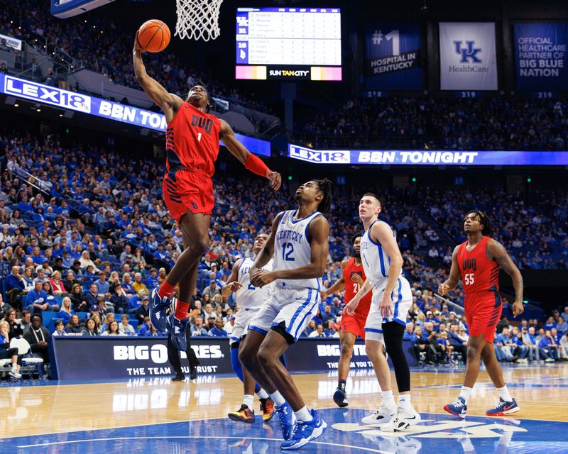 Nov 11, 2022; Lexington, Kentucky, USA; Duquesne Dukes guard Jimmy Clark III (1) dunks the ball during the first half against the Kentucky Wildcats at Rupp Arena at Central Bank Center. Mandatory Credit: Jordan Prather-USA TODAY Sports