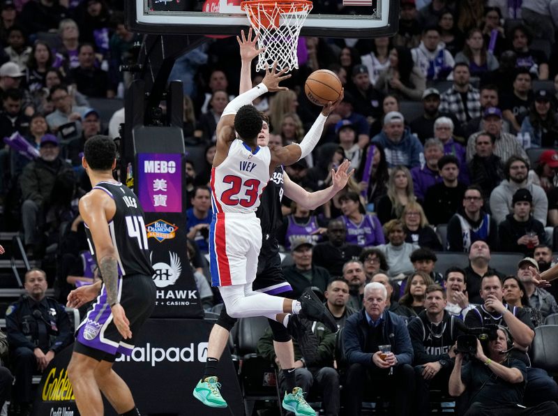 SACRAMENTO, CALIFORNIA - FEBRUARY 07: Jaden Ivey #23 of the Detroit Pistons shoots the ball against Kevin Huerter #9 of the Sacramento Kings in the fourth quarter at Golden 1 Center on February 07, 2024 in Sacramento, California. NOTE TO USER: User expressly acknowledges and agrees that, by downloading and or using this photograph, User is consenting to the terms and conditions of the Getty Images License Agreement. (Photo by Thearon W. Henderson/Getty Images)