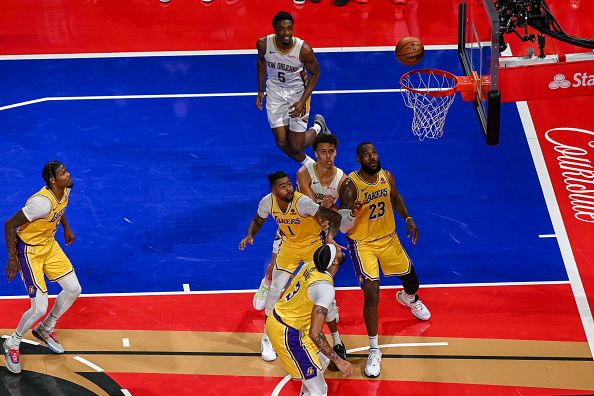 LAS VEGAS, NEVADA - DECEMBER 7: LeBron James (23) of Los Angeles Lakers and Dyson Daniels (11) of New Orleans Pelicans in action during NBA In-Season Tournament Semifinals game between Los Angeles Lakers and New Orleans Pelicans at the T-Mobile Arena in Las Vegas, Nevada, United States on December 7, 2023. (Photo by Tayfun Coskun/Anadolu via Getty Images)