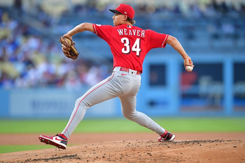 Jul 29, 2023; Los Angeles, California, USA; Cincinnati Reds starting pitcher Luke Weaver (34) throws agianst the Los Angeles Dodgers during the first inning at Dodger Stadium. Mandatory Credit: Gary A. Vasquez-USA TODAY Sports