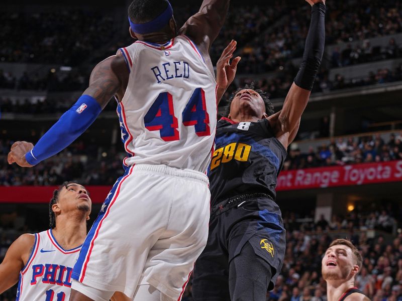 DENVER, CO - JANUARY 27: Peyton Watson #8 of the Denver Nuggets drives to the basket during the game against the Philadelphia 76ers on January 27, 2024 at the Ball Arena in Denver, Colorado. NOTE TO USER: User expressly acknowledges and agrees that, by downloading and/or using this Photograph, user is consenting to the terms and conditions of the Getty Images License Agreement. Mandatory Copyright Notice: Copyright 2024 NBAE (Photo by Bart Young/NBAE via Getty Images)