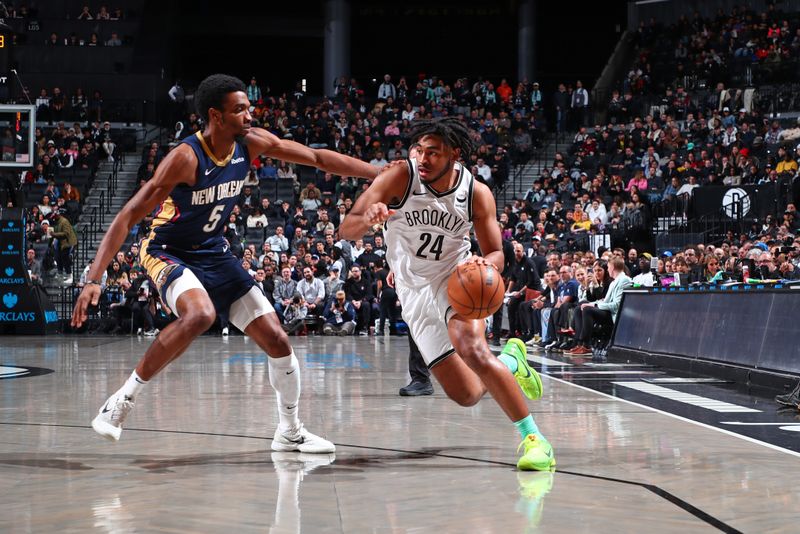 BROOKLYN, NY - MARCH 19: Cam Thomas #24 of the Brooklyn Nets dribbles the ball during the game against the New Orleans Pelicans on March 19, 2024 at Barclays Center in Brooklyn, New York. NOTE TO USER: User expressly acknowledges and agrees that, by downloading and or using this Photograph, user is consenting to the terms and conditions of the Getty Images License Agreement. Mandatory Copyright Notice: Copyright 2024 NBAE (Photo by David L. Nemec/NBAE via Getty Images)