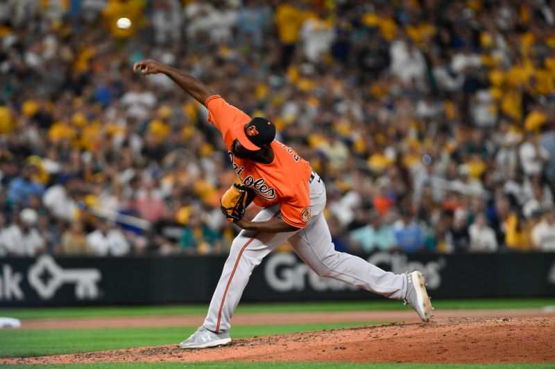 Aug 12, 2023; Seattle, Washington, USA; Baltimore Orioles relief pitcher Felix Bautista (74) pitches to the Seattle Mariners during the ninth inning at T-Mobile Park. Mandatory Credit: Steven Bisig-USA TODAY Sports