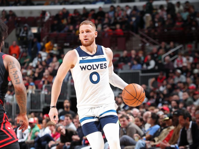 CHICAGO, IL - NOVEMBER 7: Donte DiVincenzo #0 of the Minnesota Timberwolves dribbles the ball during the game against the Chicago Bulls on November 7, 2024 at United Center in Chicago, Illinois. NOTE TO USER: User expressly acknowledges and agrees that, by downloading and or using this photograph, User is consenting to the terms and conditions of the Getty Images License Agreement. Mandatory Copyright Notice: Copyright 2024 NBAE (Photo by Jeff Haynes/NBAE via Getty Images)