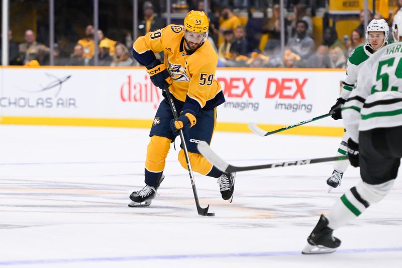 Oct 10, 2024; Nashville, Tennessee, USA; Nashville Predators defenseman Roman Josi (59) skates against the Dallas Stars during the first period at Bridgestone Arena. Mandatory Credit: Steve Roberts-Imagn Images