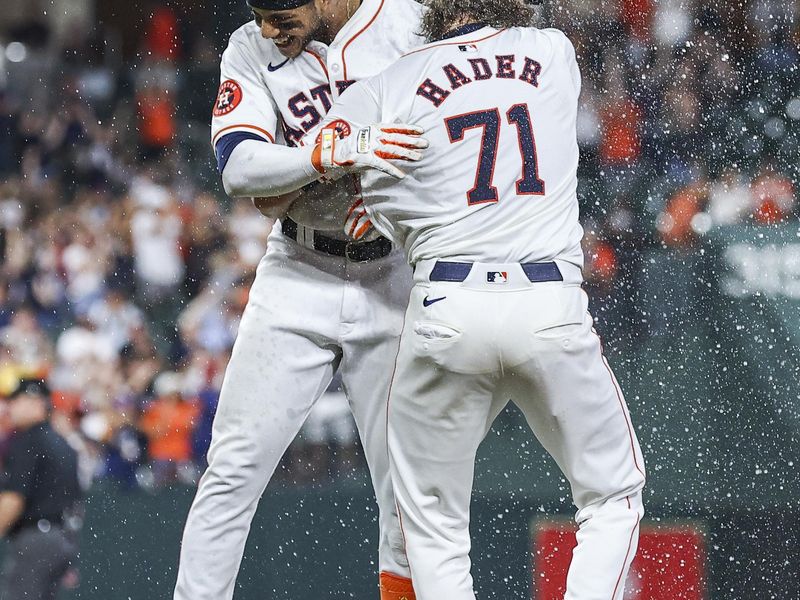 May 21, 2024; Houston, Texas, USA; Houston Astros relief pitcher Josh Hader (71) celebrates with Jeremy Pena (3) after Pena hits a walk-off RBI single during the tenth inning against the Los Angeles Angels at Minute Maid Park. Mandatory Credit: Troy Taormina-USA TODAY Sports