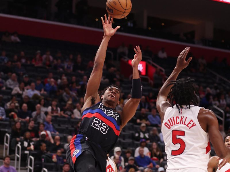 DETROIT, MICHIGAN - MARCH 13: Jaden Ivey #23 of the Detroit Pistons shoots over Immanuel Quickley #5 of the Toronto Raptors during the first half at Little Caesars Arena on March 13, 2024 in Detroit, Michigan. NOTE TO USER: User expressly acknowledges and agrees that, by downloading and or using this photograph, User is consenting to the terms and conditions of the Getty Images License.  (Photo by Gregory Shamus/Getty Images)