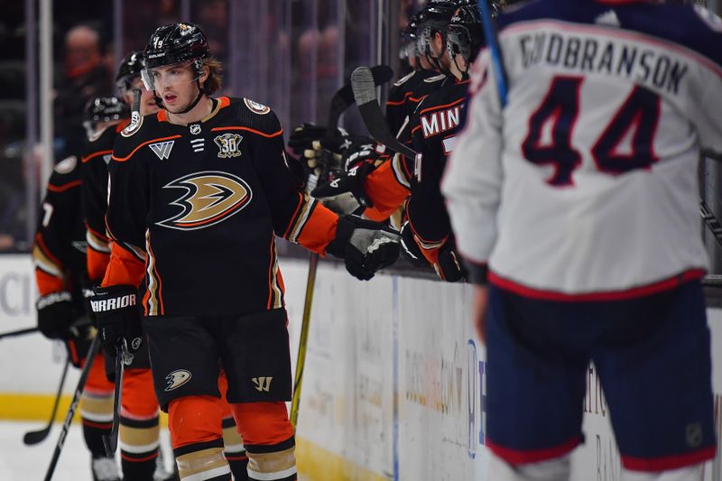 Feb 21, 2024; Anaheim, California, USA; Anaheim Ducks right wing Troy Terry (19) celebrates his goal scored against the Columbus Blue Jackets during the second period at Honda Center. Mandatory Credit: Gary A. Vasquez-USA TODAY Sports