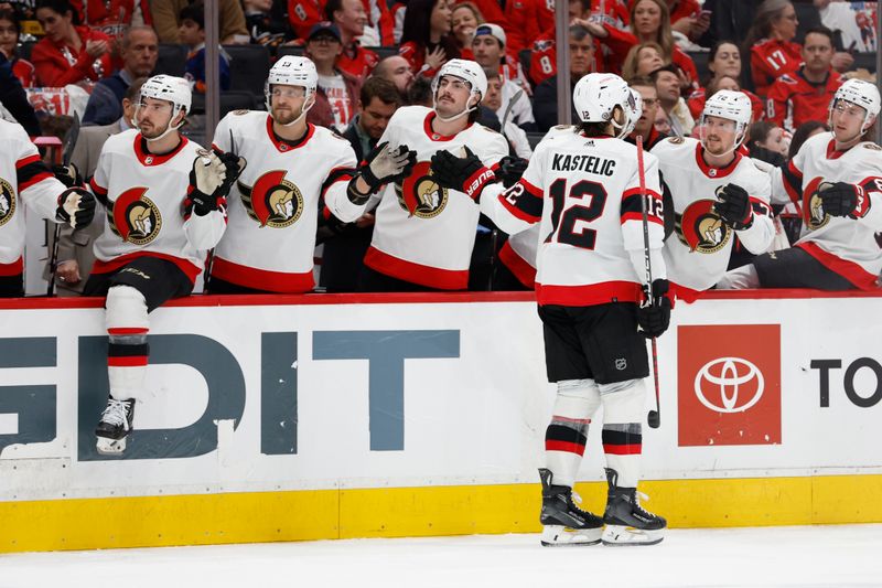 Apr 7, 2024; Washington, District of Columbia, USA; Ottawa Senators center Mark Kastelic (12) celebrates with teammates after scoring a goal against the Washington Capitals in the second period at Capital One Arena. Mandatory Credit: Geoff Burke-USA TODAY Sports