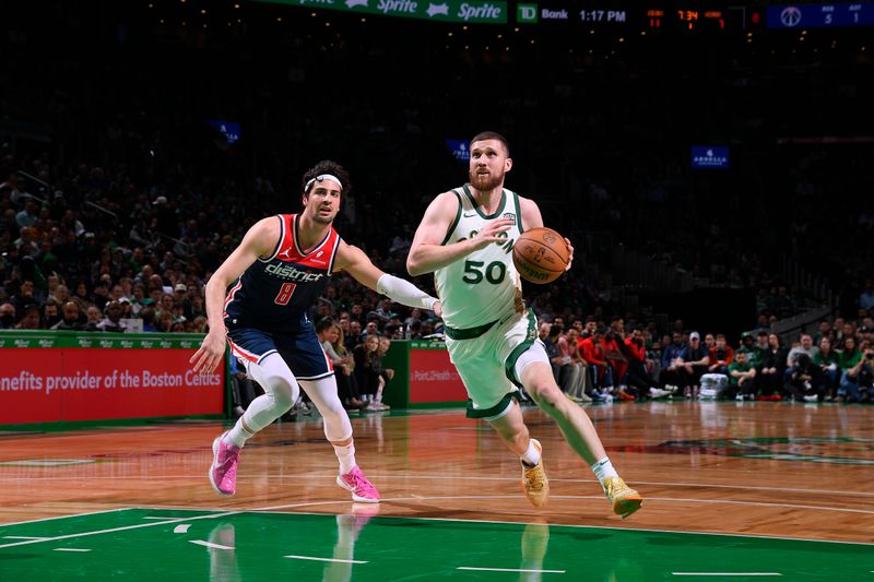 BOSTON, MA - APRIL 14: Svi Mykhailiuk #50 of the Boston Celtics drives to the basket during the game  against the Washington Wizards on April 14, 2024 at the TD Garden in Boston, Massachusetts. NOTE TO USER: User expressly acknowledges and agrees that, by downloading and or using this photograph, User is consenting to the terms and conditions of the Getty Images License Agreement. Mandatory Copyright Notice: Copyright 2024 NBAE  (Photo by Brian Babineau/NBAE via Getty Images)