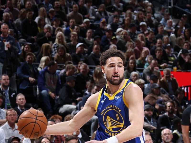 SALT LAKE CITY, UT - FEBRUARY 15: Klay Thompson #11 of the Golden State Warriors drives to the basket during the game against the Utah Jazz on February 15, 2024 at Delta Center in Salt Lake City, Utah. NOTE TO USER: User expressly acknowledges and agrees that, by downloading and or using this Photograph, User is consenting to the terms and conditions of the Getty Images License Agreement. Mandatory Copyright Notice: Copyright 2024 NBAE (Photo by Melissa Majchrzak/NBAE via Getty Images)