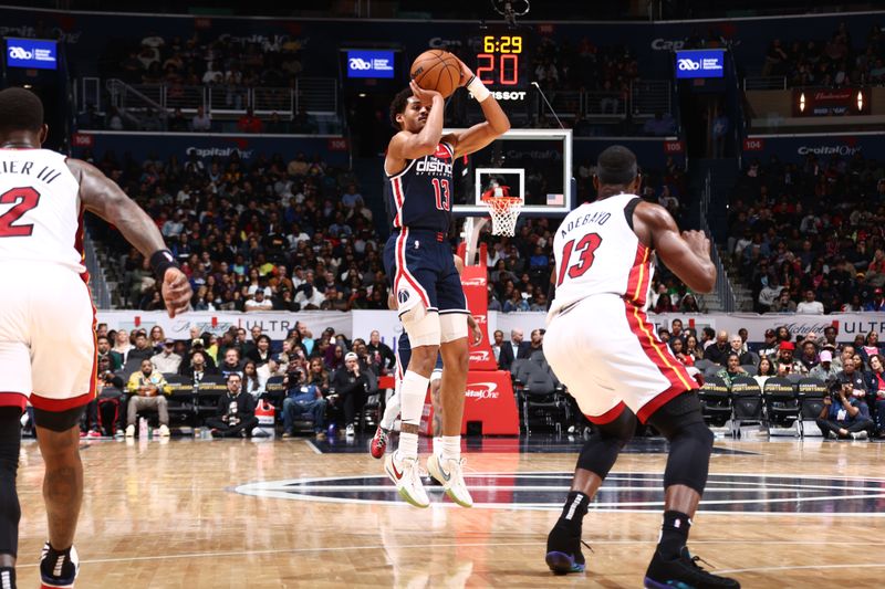 WASHINGTON, DC -? MARCH 31: Jordan Poole #13 of the Washington Wizards shoots the ball during the game against the Miami Heat on March 31, 2024 at Capital One Arena in Washington, DC. NOTE TO USER: User expressly acknowledges and agrees that, by downloading and or using this Photograph, user is consenting to the terms and conditions of the Getty Images License Agreement. Mandatory Copyright Notice: Copyright 2024 NBAE (Photo by Kenny Giarla/NBAE via Getty Images)