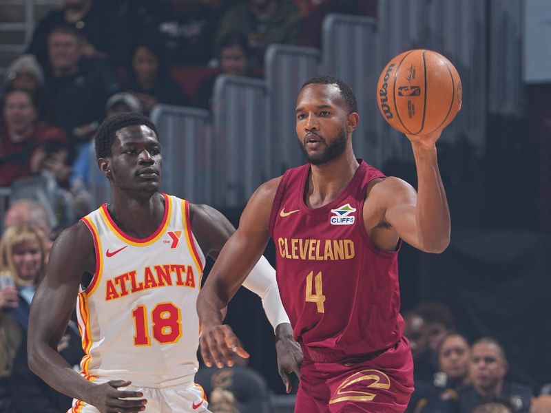 CLEVELAND, OH - JANUARY 30:  Evan Mobley #4 of the Cleveland Cavaliers passes the ball during the game against the Atlanta Hawks on January 30, 2025 at Rocket Mortgage FieldHouse in Cleveland, Ohio. NOTE TO USER: User expressly acknowledges and agrees that, by downloading and/or using this Photograph, user is consenting to the terms and conditions of the Getty Images License Agreement. Mandatory Copyright Notice: Copyright 2025 NBAE (Photo by Garrett Ellwood/NBAE via Getty Images)