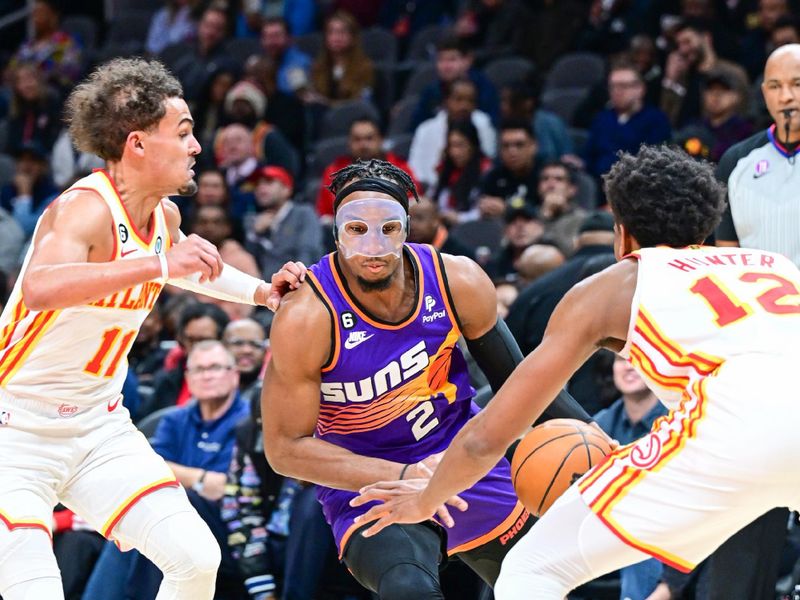 ATLANTA, GA - FEBUARY 9: Josh Okogie #2 of the Phoenix Suns goes to the basket during the game  on Febuary 9, 2023 at State Farm Arena in Atlanta, Georgia.  NOTE TO USER: User expressly acknowledges and agrees that, by downloading and/or using this Photograph, user is consenting to the terms and conditions of the Getty Images License Agreement. Mandatory Copyright Notice: Copyright 2023 NBAE (Photo by Adam Hagy/NBAE via Getty Images)