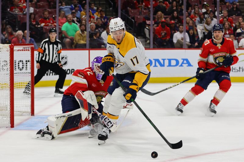 Nov 7, 2024; Sunrise, Florida, USA; Nashville Predators center Mark Jankowski (17) moves the puck against Florida Panthers goaltender Sergei Bobrovsky (72) during the first period at Amerant Bank Arena. Mandatory Credit: Sam Navarro-Imagn Images