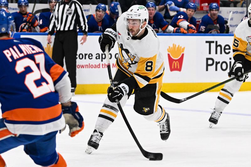 Apr 17, 2024; Elmont, New York, USA;  Pittsburgh Penguins left wing Michael Bunting (8) attempts a shot against the New York Islanders during the third period at UBS Arena. Mandatory Credit: Dennis Schneidler-USA TODAY Sports