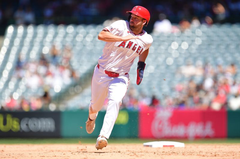 Jun 27, 2024; Anaheim, California, USA; Los Angeles Angels first baseman Nolan Schanuel (18) runs to third against the Detroit Tigers during the sixth inning at Angel Stadium. Mandatory Credit: Gary A. Vasquez-USA TODAY Sports