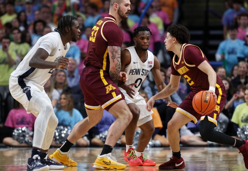 Jan 27, 2024; University Park, Pennsylvania, USA; Penn State Nittany Lions guard Kanye Clary (0) defends as Minnesota Golden Gophers guard Mike Mitchell Jr (2) dribbles the ball during the first half at Bryce Jordan Center. Minnesota defeated Penn State 83-74. Mandatory Credit: Matthew O'Haren-USA TODAY Sports