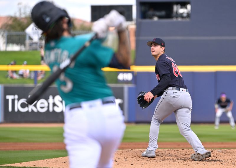 Feb 28, 2023; Peoria, Arizona, USA; Seattle Cleveland Guardians starting pitcher Logan Allen (88) throws to the plate against Seattle Mariners shortstop J.P. Crawford (3) the first inning of a spring training game at the Peoria Sports Complex. Mandatory Credit: Jayne Kamin-Oncea-USA TODAY Sports