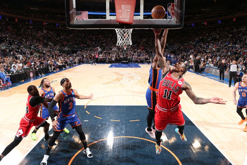 NEW YORK, NY - APRIL 14:  DeMar DeRozan #11 of the Chicago Bulls shoots the ball during the game against the New York Knicks on April 14, 2024 at Madison Square Garden in New York City, New York.  NOTE TO USER: User expressly acknowledges and agrees that, by downloading and or using this photograph, User is consenting to the terms and conditions of the Getty Images License Agreement. Mandatory Copyright Notice: Copyright 2024 NBAE  (Photo by Nathaniel S. Butler/NBAE via Getty Images)