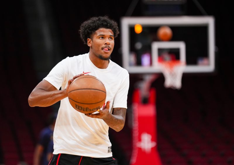 HOUSTON, TEXAS - OCTOBER 10: Jalen Green #4 of the Houston Rockets sets up with the ball during warm-up prior to the preseason game against the Indiana Pacers at Toyota Center on October 10, 2023 in Houston, Texas. NOTE TO USER: User expressly acknowledges and agrees that, by downloading and or using this photograph, User is consenting to the terms and conditions of the Getty Images License Agreement. (Photo by Alex Bierens de Haan/Getty Images)