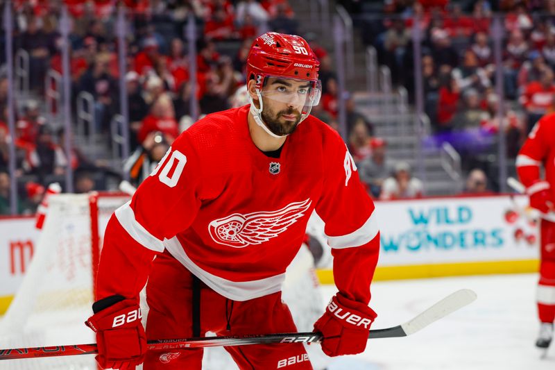 Dec 9, 2023; Detroit, Michigan, USA; Detroit Red Wings center Joe Veleno (90) looks on during the first period at Little Caesars Arena. Mandatory Credit: Brian Bradshaw Sevald-USA TODAY Sports