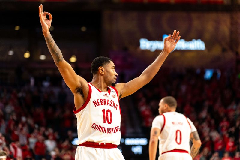 Jan 23, 2024; Lincoln, Nebraska, USA; Nebraska Cornhuskers guard Jamarques Lawrence (10) celebrates after a 3-point shot by forward Rienk Mast (51) against the Ohio State Buckeyes during the second half at Pinnacle Bank Arena. Mandatory Credit: Dylan Widger-USA TODAY Sports