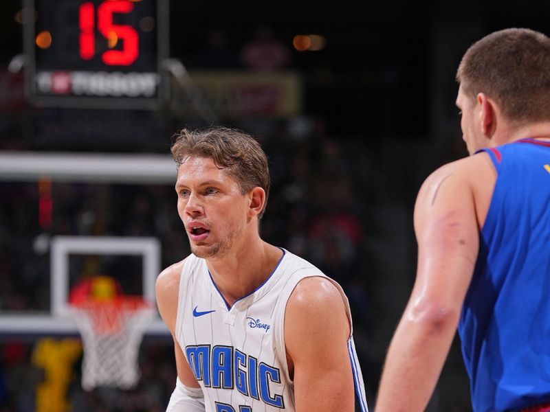 DENVER, CO - JANUARY 5: Moritz Wagner #21 of the Orlando Magic handles the ball during the game against the Denver Nuggets on January 5, 2024 at the Ball Arena in Denver, Colorado. NOTE TO USER: User expressly acknowledges and agrees that, by downloading and/or using this Photograph, user is consenting to the terms and conditions of the Getty Images License Agreement. Mandatory Copyright Notice: Copyright 2024 NBAE (Photo by Bart Young/NBAE via Getty Images)