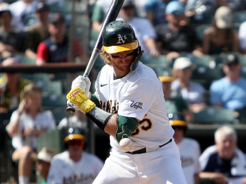 Sep 10, 2025; West Sacramento, California, USA; Athletics catcher Willie Maclver (65) gets hit by a pitch against the Boston Red Sox during the eighth inning at Sutter Health Park. Mandatory Credit: Dennis Lee-Imagn Images