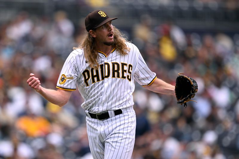 Aug 19, 2023; San Diego, California, USA; San Diego Padres relief pitcher Scott Barlow (58) reacts after a strike out to end the top of the eighth inning against the Arizona Diamondbacks at Petco Park. Mandatory Credit: Orlando Ramirez-USA TODAY Sports