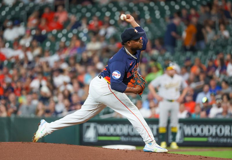 May 15, 2024; Houston, Texas, USA; Houston Astros pitcher Framber Valdez (59) pitches against the Oakland Athletics in the first inning at Minute Maid Park. Mandatory Credit: Thomas Shea-USA TODAY Sports