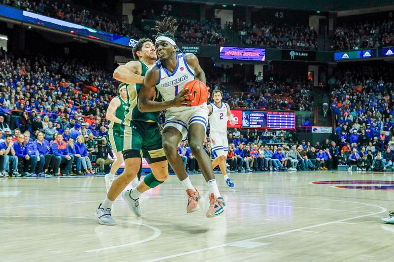 Jan 9, 2024; Boise, Idaho, USA; Boise State Broncos forward O'Mar Stanley (1) drives during the second half against the Colorado State Rams at ExtraMile Arena. Mandatory Credit: Brian Losness-USA TODAY Sports