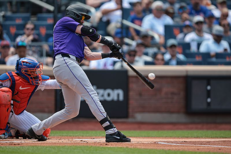 Jul 14, 2024; New York City, New York, USA; Colorado Rockies designated hitter Charlie Blackmon (19) singles during the first inning against the New York Mets at Citi Field. Mandatory Credit: Vincent Carchietta-USA TODAY Sports