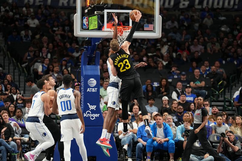 DALLAS, TX - OCTOBER 10: Lauri Markkanen #23 of the Utah Jazz attempts a dunk during the game against the Dallas Mavericks on October 10, 2024 at American Airlines Center in Dallas, Texas. NOTE TO USER: User expressly acknowledges and agrees that, by downloading and or using this photograph, User is consenting to the terms and conditions of the Getty Images License Agreement. Mandatory Copyright Notice: Copyright 2024 NBAE (Photo by Glenn James/NBAE via Getty Images)