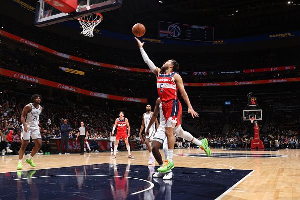 WASHINGTON, DC -? DECEMBER 29: Tyus Jones #5 of the Washington Wizards drives to the basket during the game against the Brooklyn Nets on December 29, 2023 at Capital One Arena in Washington, DC. NOTE TO USER: User expressly acknowledges and agrees that, by downloading and or using this Photograph, user is consenting to the terms and conditions of the Getty Images License Agreement. Mandatory Copyright Notice: Copyright 2023 NBAE (Photo by Stephen Gosling/NBAE via Getty Images)