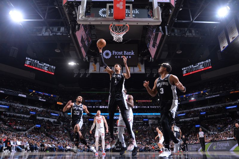 SAN ANTONIO, TX - MARCH 29: Victor Wembanyama #1 of the San Antonio Spurs goes up for the rebound during the game against the New York Knicks on March 29, 2024 at the Frost Bank Center in San Antonio, Texas. NOTE TO USER: User expressly acknowledges and agrees that, by downloading and or using this photograph, user is consenting to the terms and conditions of the Getty Images License Agreement. Mandatory Copyright Notice: Copyright 2024 NBAE (Photos by Michael Gonzales/NBAE via Getty Images)