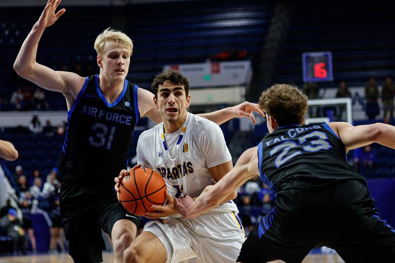 Jan 13, 2024; Colorado Springs, Colorado, USA; San Jose State Spartans guard Alvaro Cardenas (13) controls the ball under pressure from Air Force Falcons forward Rytis Petraitis (31) and guard Kellan Boylan (23) in the second half at Clune Arena. Mandatory Credit: Isaiah J. Downing-USA TODAY Sports