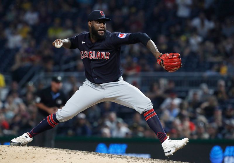 Jul 18, 2023; Pittsburgh, Pennsylvania, USA; Cleveland Guardians relief pitcher Enyel De Los Santos (62) pitches against the Pittsburgh Pirates during the seventh inning at PNC Park. Mandatory Credit: Charles LeClaire-USA TODAY Sports