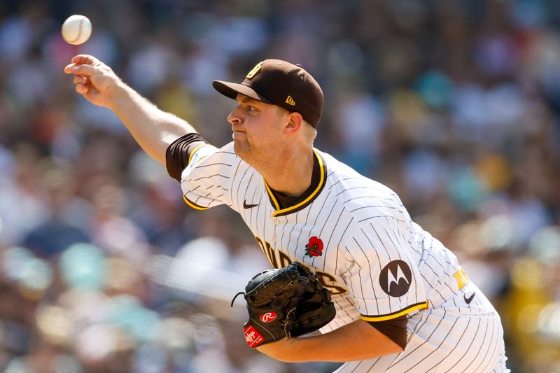 May 27, 2024; San Diego, California, USA;  San Diego Padres starting pitcher Michael King (34) throws a pitch during the first inning against the Miami Marlins at Petco Park. Mandatory Credit: David Frerker-USA TODAY Sports