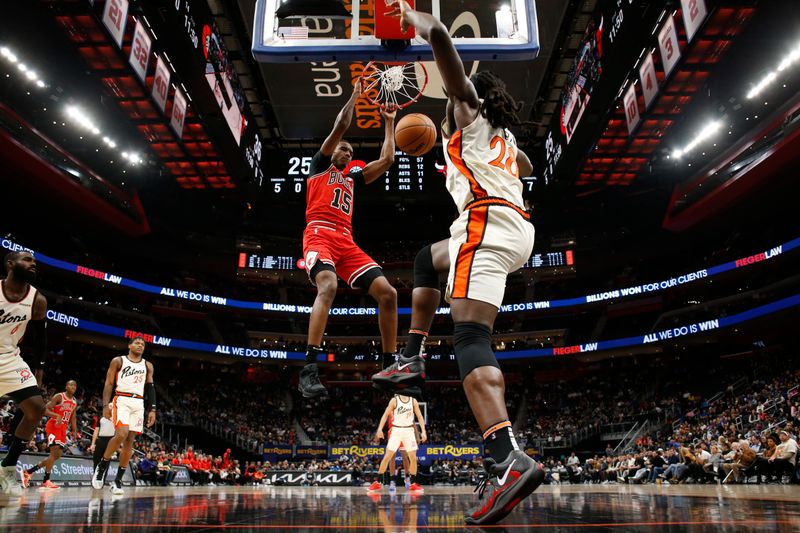 DETROIT, MI - NOVEMBER 18: Julian Phillips #15 of the Chicago Bulls dunks the ball during the game against the Detroit Pistons on November 18, 2024 at Little Caesars Arena in Detroit, Michigan. NOTE TO USER: User expressly acknowledges and agrees that, by downloading and/or using this photograph, User is consenting to the terms and conditions of the Getty Images License Agreement. Mandatory Copyright Notice: Copyright 2024 NBAE (Photo by Brian Sevald/NBAE via Getty Images)