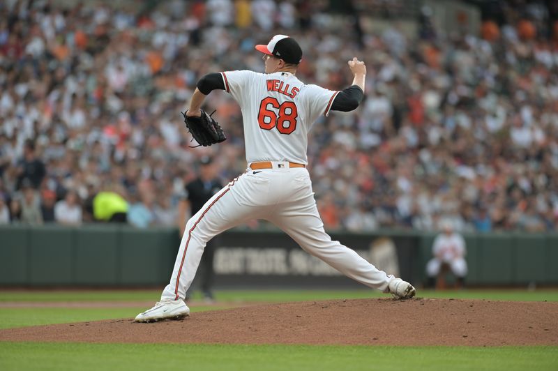 Jul 29, 2023; Baltimore, Maryland, USA;  Baltimore Orioles starting pitcher Tyler Wells (68) throws a first inning pitch against the New York Yankees at Oriole Park at Camden Yards. Mandatory Credit: Tommy Gilligan-USA TODAY Sports