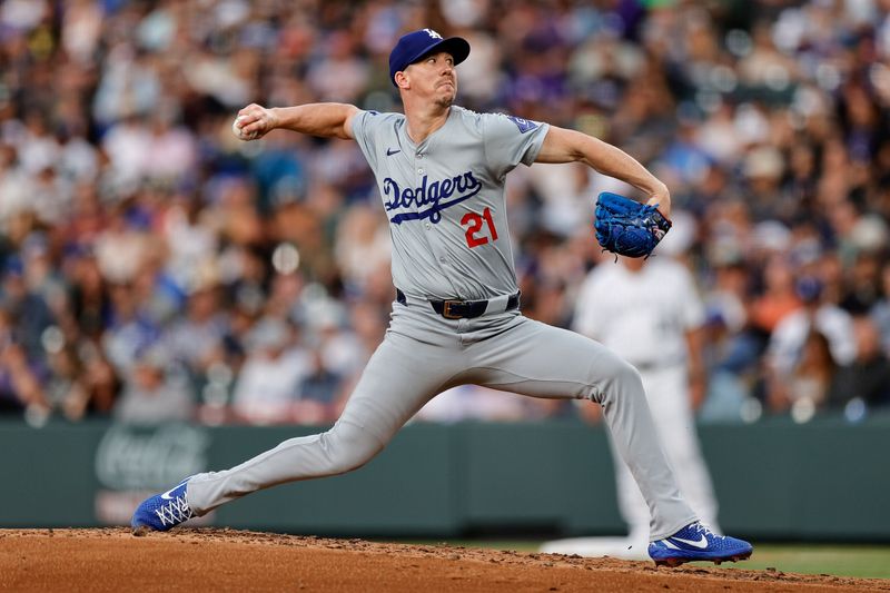 Jun 18, 2024; Denver, Colorado, USA; Los Angeles Dodgers starting pitcher Walker Buehler (21) pitches in the second inning against the Colorado Rockies at Coors Field. Mandatory Credit: Isaiah J. Downing-USA TODAY Sports