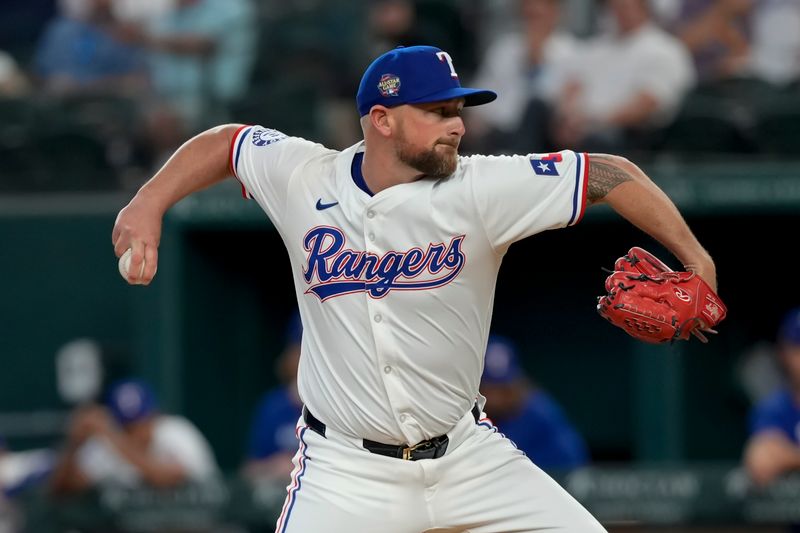 May 29, 2024; Arlington, Texas, USA; Texas Rangers relief pitcher Kirby Yates (39) delivers a pitch to the Arizona Diamondbacks during the ninth inning at Globe Life Field. Mandatory Credit: Jim Cowsert-USA TODAY Sports