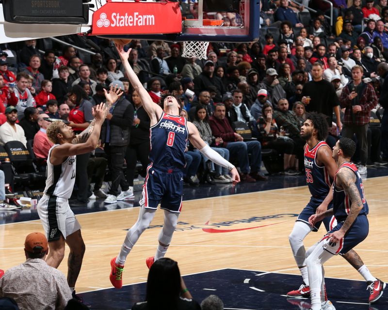 WASHINGTON, DC -? JANUARY 20: Deni Avdija #8 of the Washington Wizards rebounds the ball during the game against the San Antonio Spurs on January 20, 2024 at Capital One Arena in Washington, DC. NOTE TO USER: User expressly acknowledges and agrees that, by downloading and or using this Photograph, user is consenting to the terms and conditions of the Getty Images License Agreement. Mandatory Copyright Notice: Copyright 2024 NBAE (Photo by Stephen Gosling/NBAE via Getty Images)