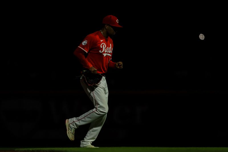 May 25, 2024; Cincinnati, Ohio, USA; Cincinnati Reds relief pitcher Alexis Diaz (43) runs onto the field at the start of the ninth inning in the game against the Los Angeles Dodgers at Great American Ball Park. Mandatory Credit: Katie Stratman-USA TODAY Sports