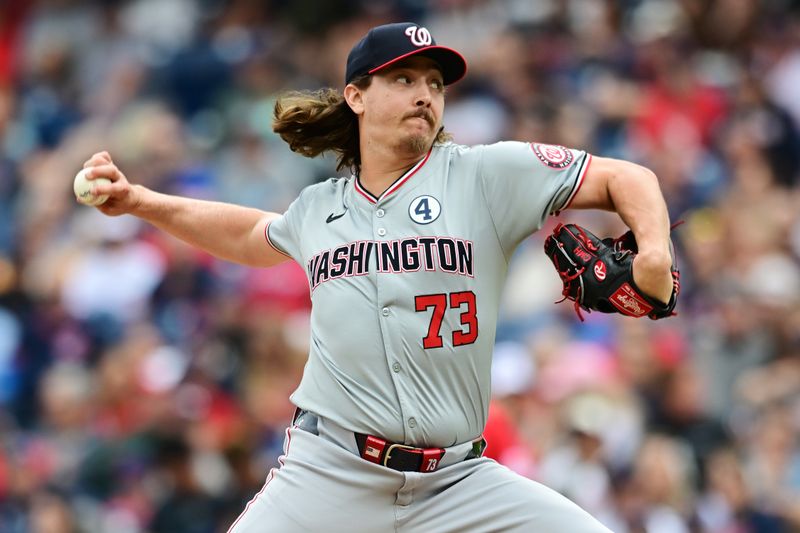 Jun 2, 2024; Cleveland, Ohio, USA; Washington Nationals relief pitcher Hunter Harvey (73) throws a pitch during the eighth inning against the Cleveland Guardians at Progressive Field. Mandatory Credit: Ken Blaze-USA TODAY Sports