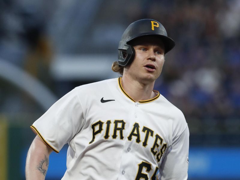 Sep 4, 2023; Pittsburgh, Pennsylvania, USA;  Pittsburgh Pirates center fielder Jack Suwinski (65) circles the bases on a two-run home run against the Milwaukee Brewers during the fourth inning at PNC Park. Mandatory Credit: Charles LeClaire-USA TODAY Sports